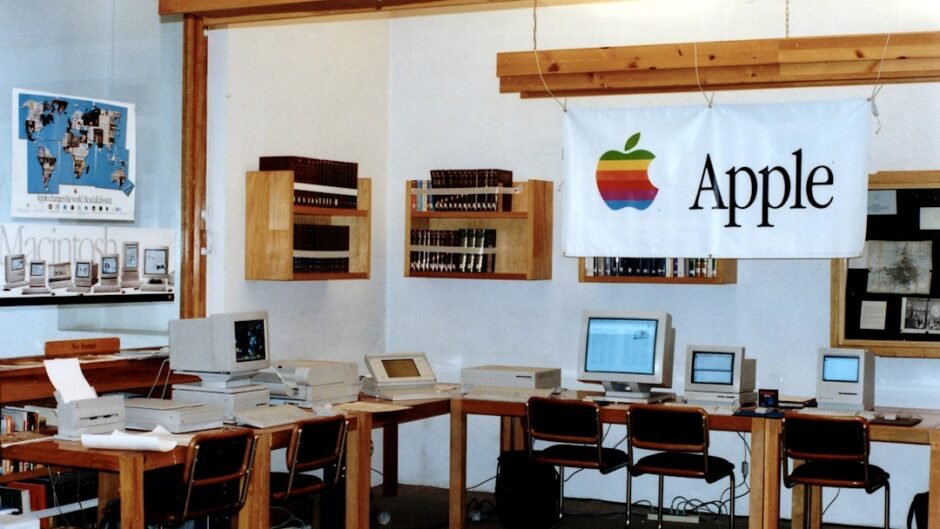 black flat screen computer monitor on white wooden desk