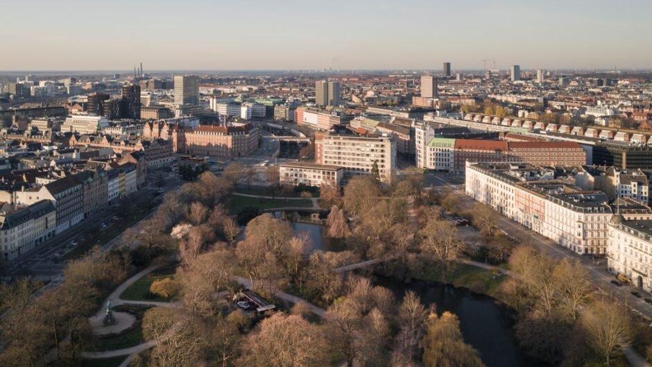 an aerial view of a city with a river running through it