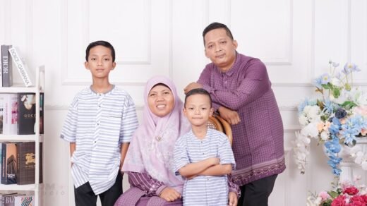 A family poses together for a group photo.