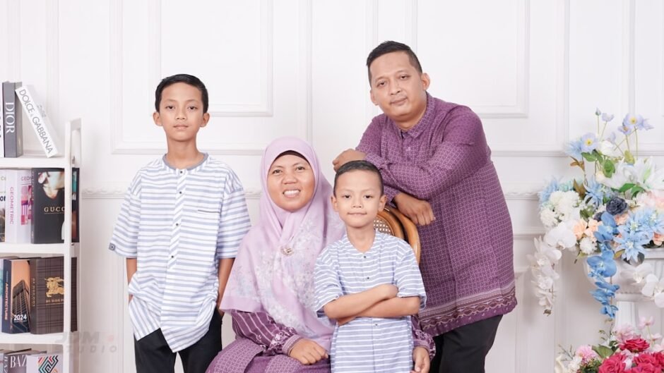 A family poses together for a group photo.