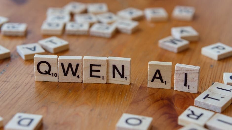Scrabble-like tiles arranged to spell 'Qwen AI' on a wooden surface, depicting technology concepts.