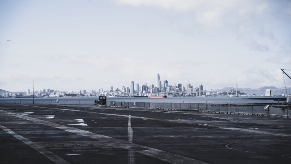 city skyline under white sky during daytime