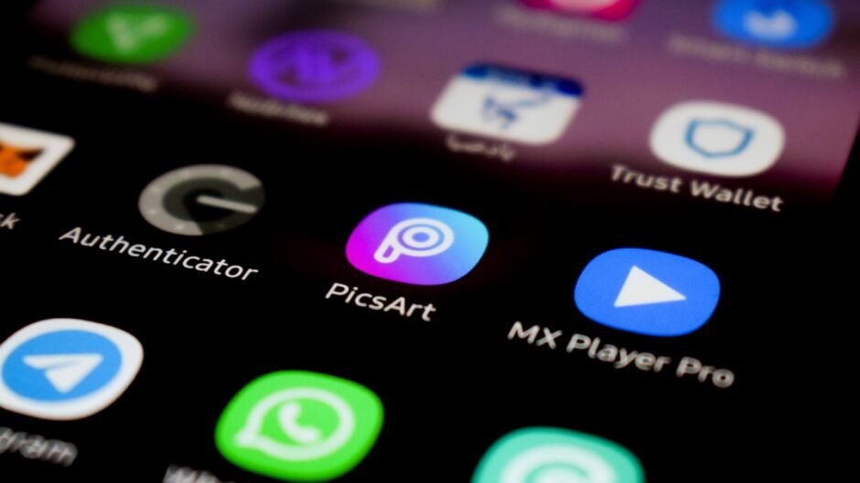 a close up of a cell phone with different app icons