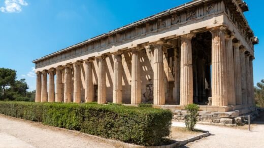 Ancient Temple of Hephaestus in Athens showcasing classic Greek architecture under a clear blue sky.