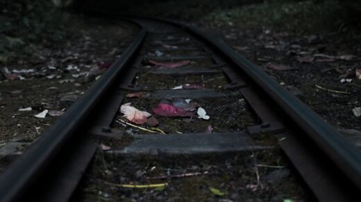 black railroad on focus photography