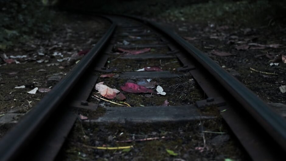 black railroad on focus photography