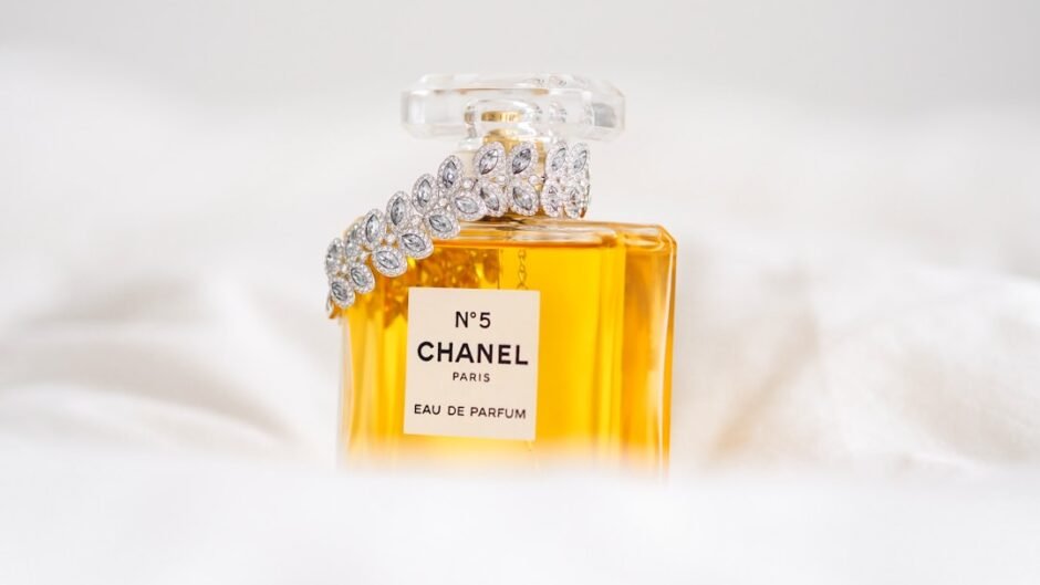 clear glass bottle with yellow liquid