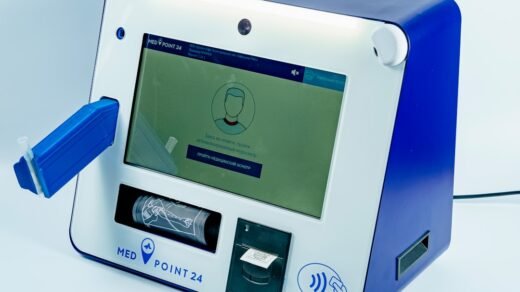 a blue and white machine with a screen on it
