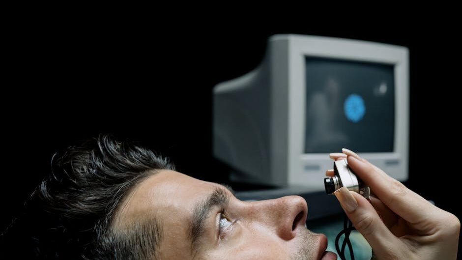 Close-up of a man during an eye examination using advanced medical technology scanner.