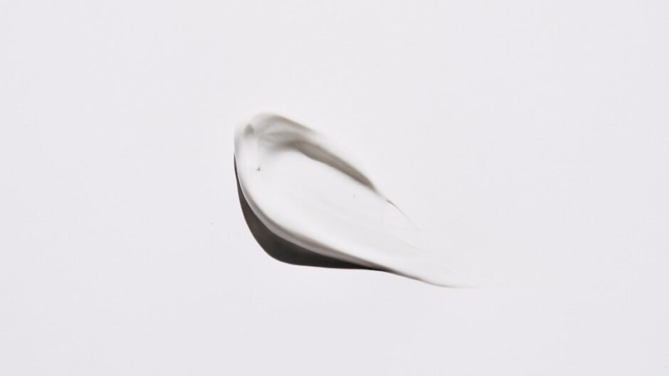 stainless steel spoon on white surface