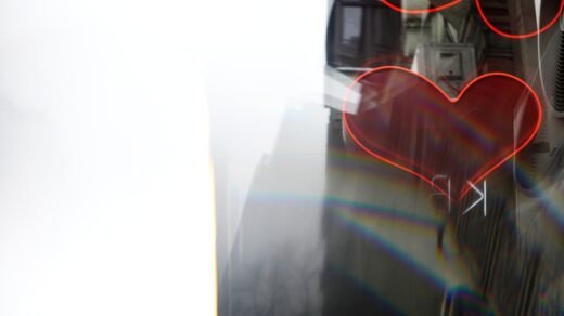 Red heart shape overlay on a blurry background